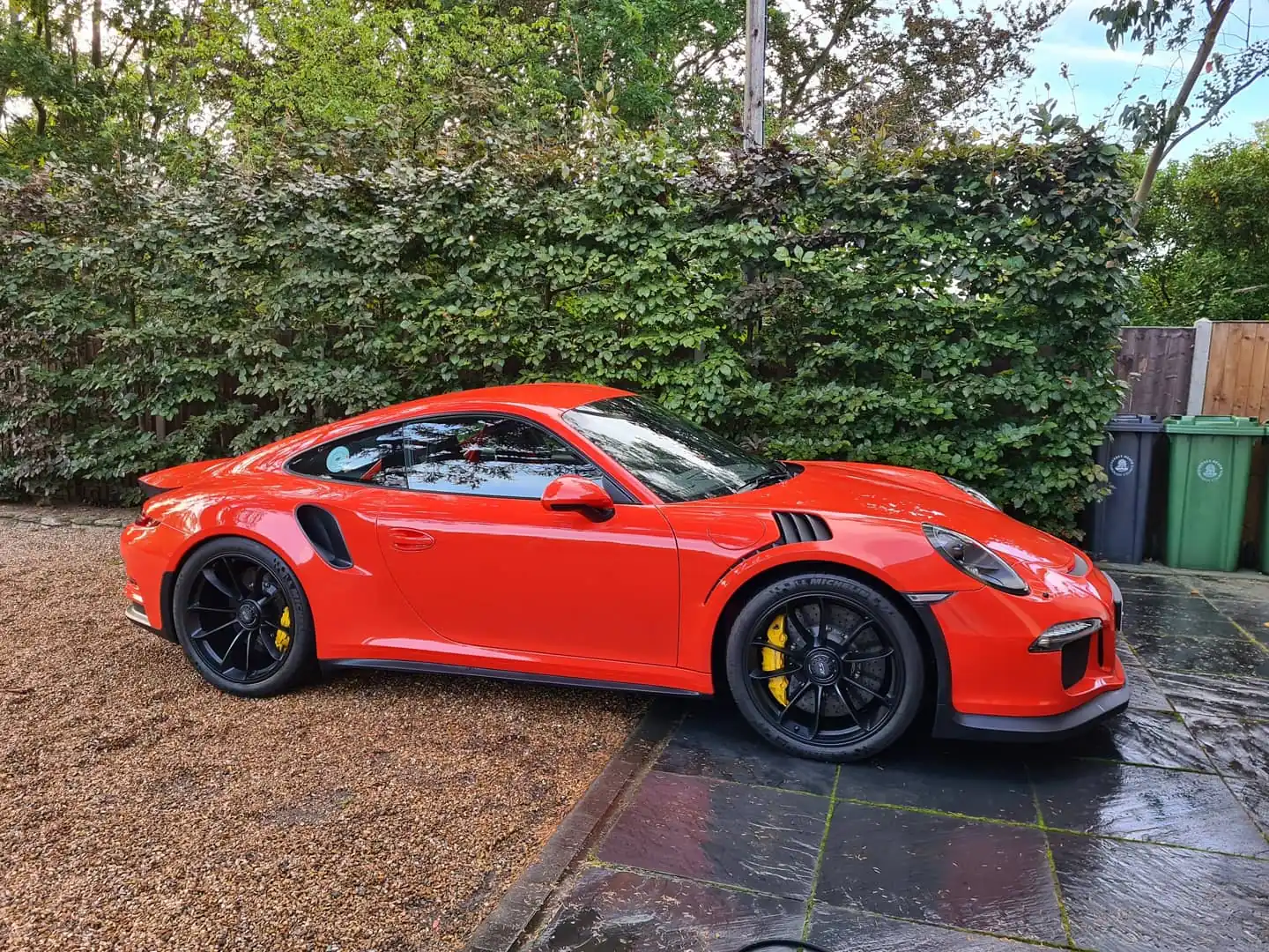 Orange Porsche 911 GT3 RS with corrected, glossy paint